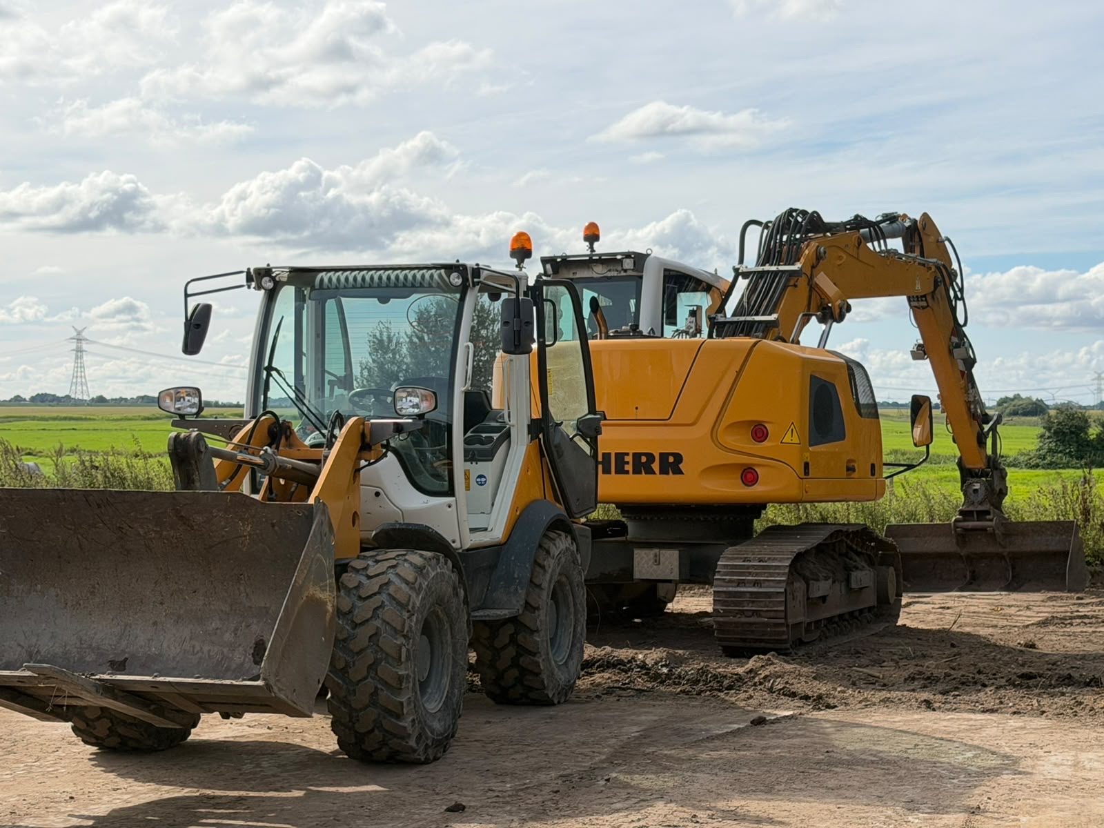 Radlader und Bagger